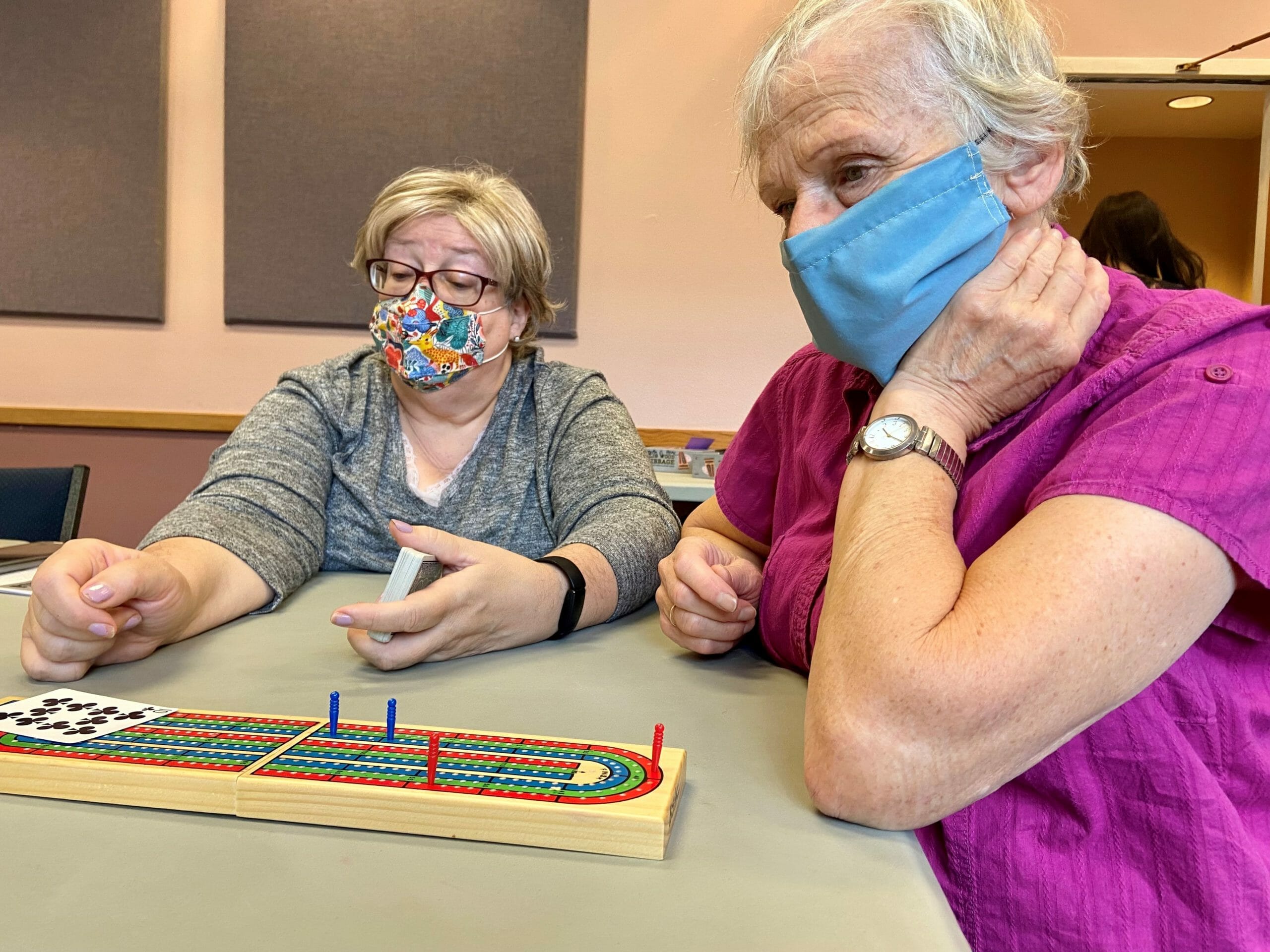 Cribbage Two women playing the game cribbage